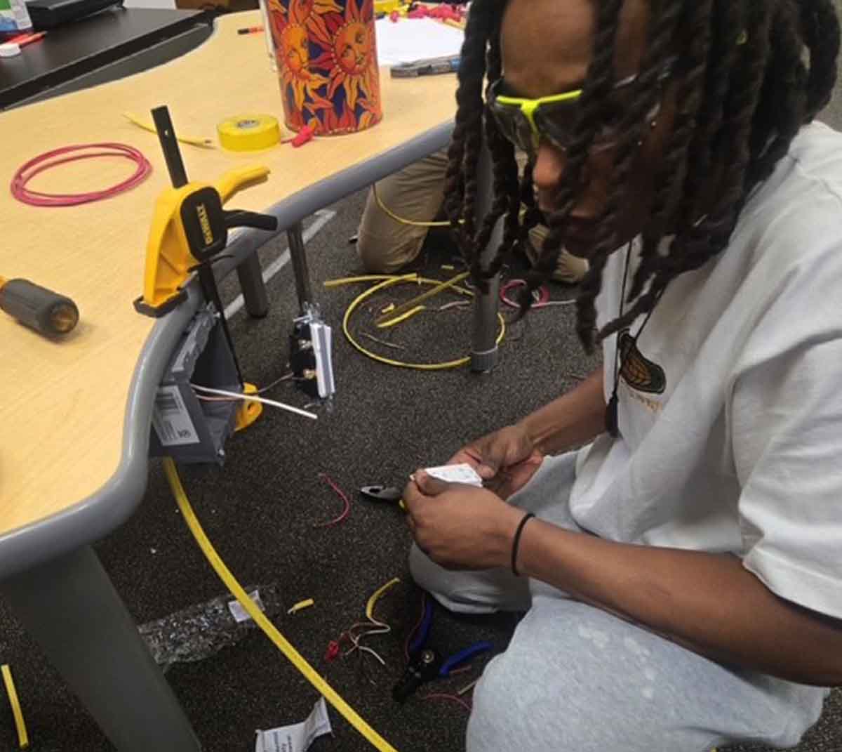 Student learing conduet bending.